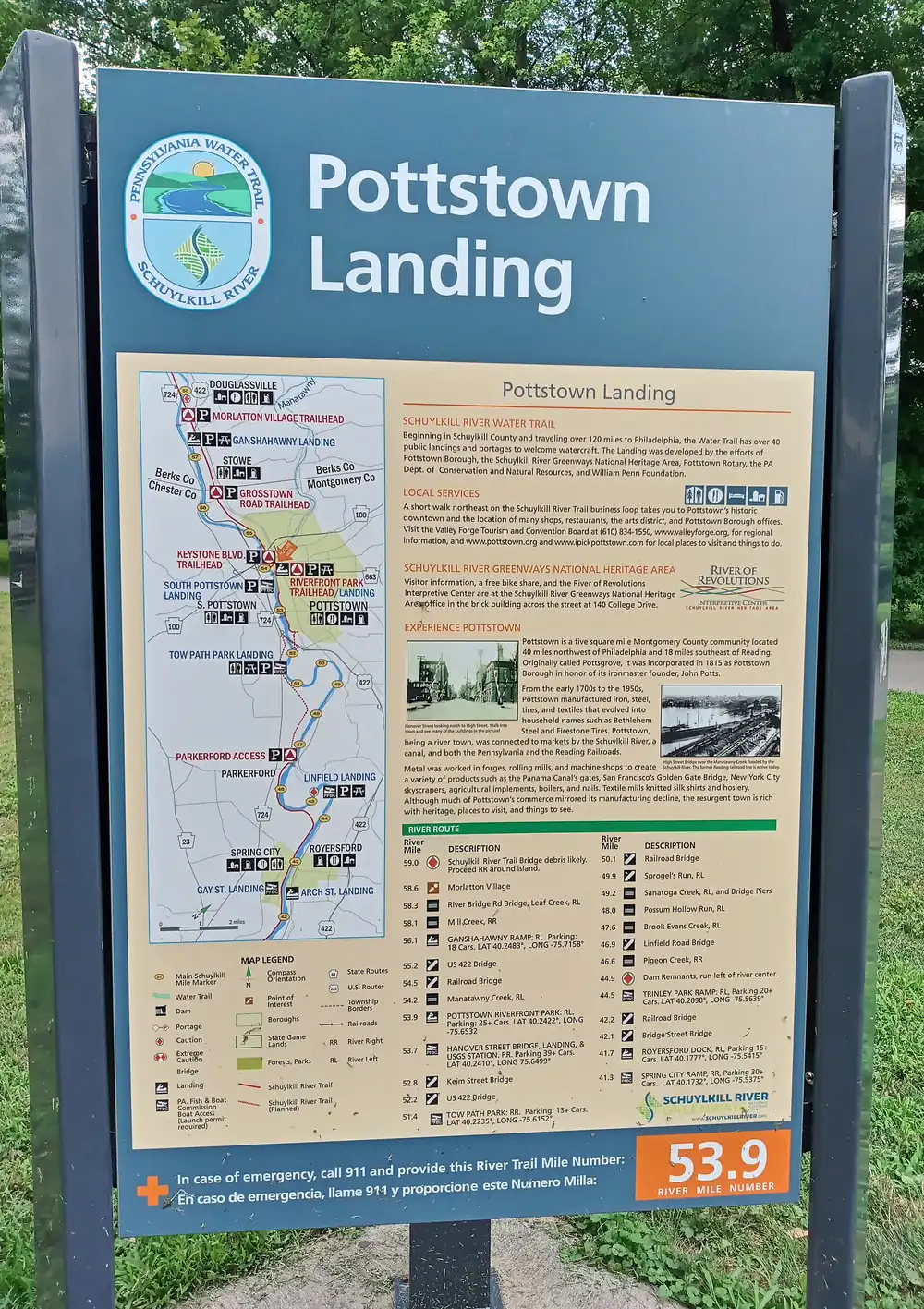 Trail map panel showing river routes beside a riverside landing